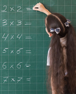 A kid solving math problem after learning vedic math